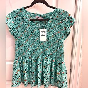 New Green Top. With tags. Size L.